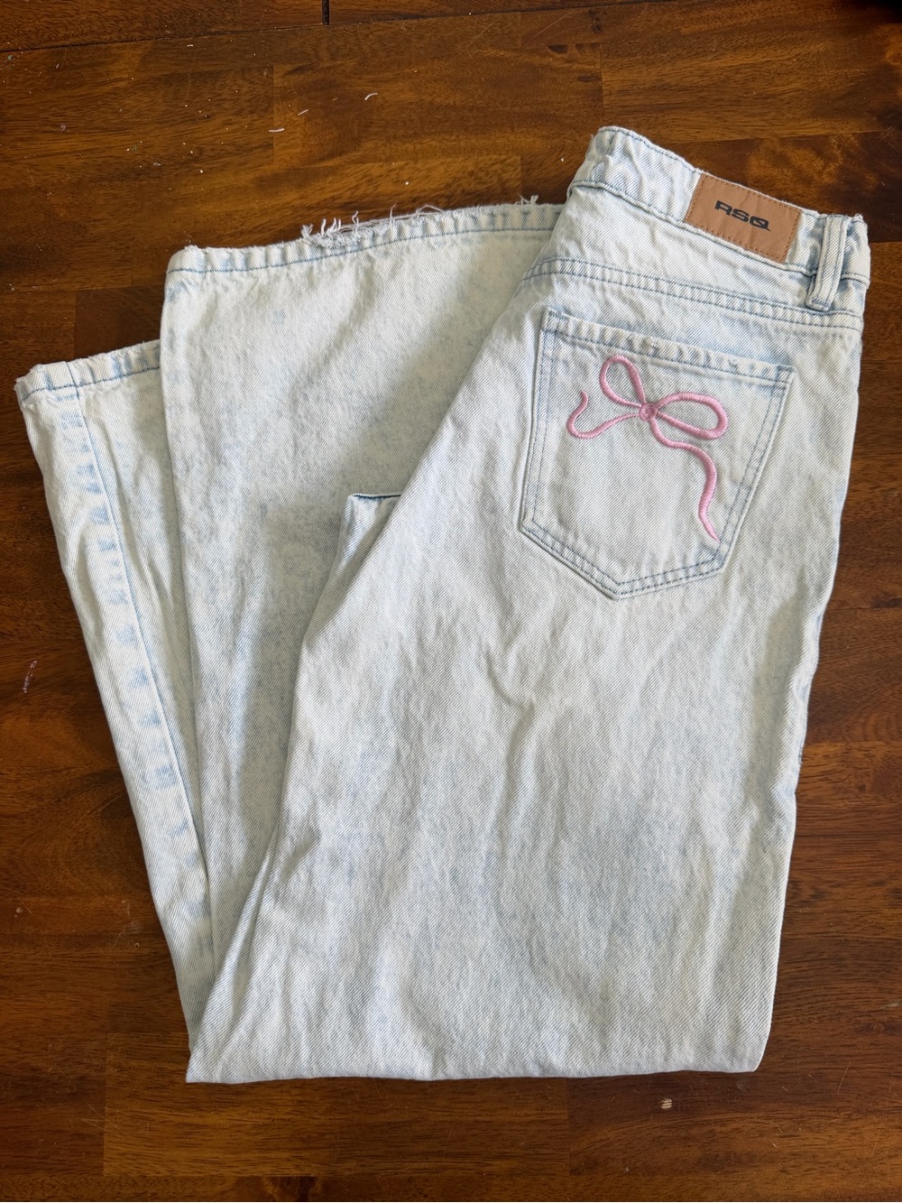 RSQ Light Wash Low rise Jeans with Pink Bows. Baggy and Wide Leg